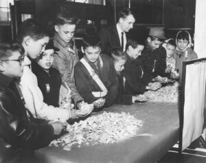 Bob Pelletier with School Kids Looking at Wood Chips