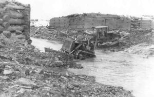 Caucomgomoc Dam with Tractors