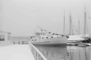 Crew Putting a Boat in the Water