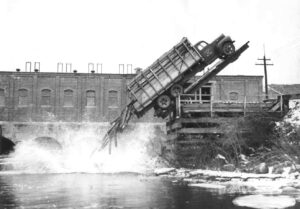 Dumping Wood From a Truck at Dolby Dam in the 1940s