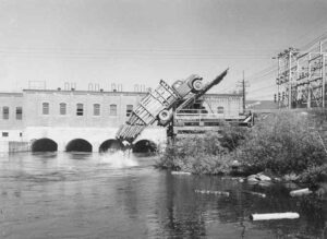 Dumping Wood From a Truck at Dolby Dam in the 1940s