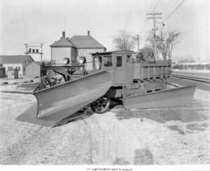 Early Snowplow in Millinocket, Maine