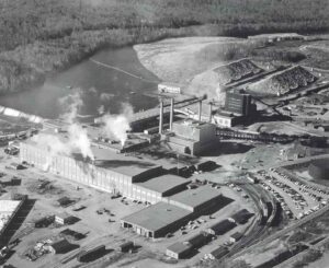 Aerial View of the East Millinocket Mill with Boom in River