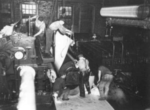 Changing Wires in the East Millinocket Mill in the 1930's