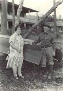 Man and Woman Getting Ready to Canoe