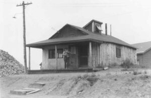 Grindstone Office with a Man Holding a Dog