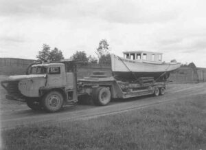 Heavy Truck Pulling a Boat