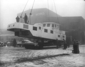 Loading the Cabin of the O.A. Harkness Boat at Bath Iron Works