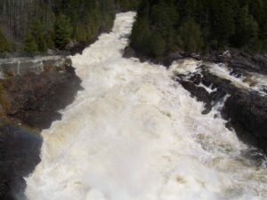 Looking Down Ripogenus Dam With Open Deep Gates