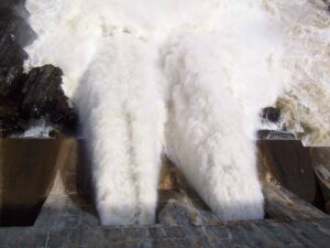 Looking Down Ripogenus Dam With Open Deep Gates