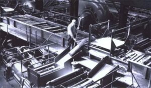 Man Working in the Millinocket Mill Grinder Room