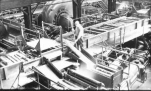 Man Working in the Millinocket Mill Grinder Room