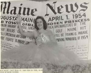 Miss Maine Mary Ellen St. John on the Great Northern Paper Float in the Cherry Blossom Festival Parade in Washington, DC on 4/1/1954