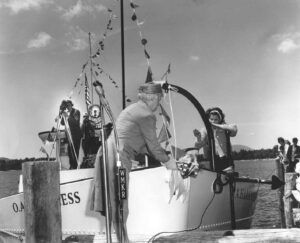 Mrs. Harkness Christening the O.A. Harkness Boat