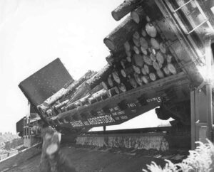 Boxcars Dumping Pulp in the River