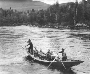 Six Men Rowing a Boat