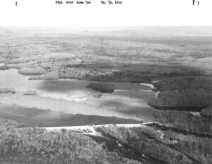 Arial View of Stone Dam with Wood in Water 5/10/1952