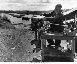 Tinkering with an Early Outboard in the 1950's