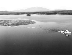 Aerial View of a Boat Towing Boom on Pemadumcook Lakes