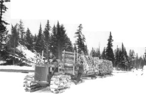 Tractor Pulling Loaded Pulp Sleds in 1956