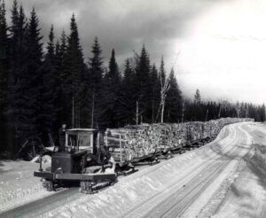 Tractor Pulling a Train Over the Road
