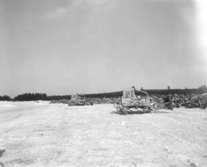 Tractors Pushing Pulp on the Ice