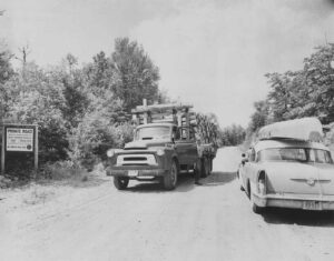 Log Truck Driver Talking to a Fisherman