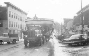 Trucking the William Hilton Boat Through Town