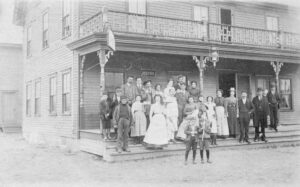 People in Front of the Windsor Hotel in Millinocket, Maine