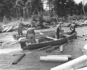 Five Men Working Pulp on the Lake in Boats