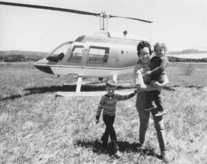 Young Family Traveling by Helicopter
